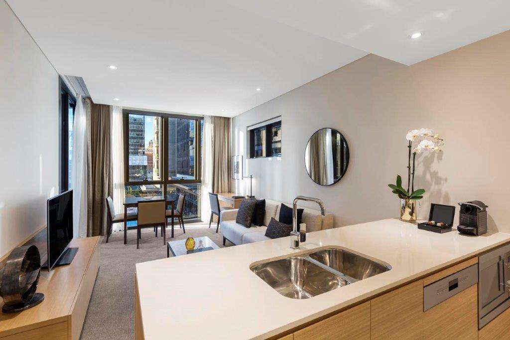 Skye Suites Sydney Ruang foto A typical apartment interior