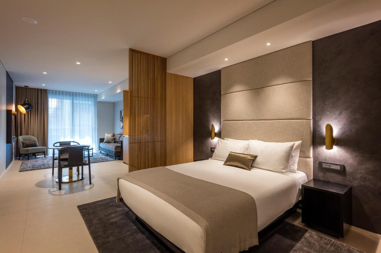 Skye Suites Sydney Bagian luar foto A bedroom at the hotel